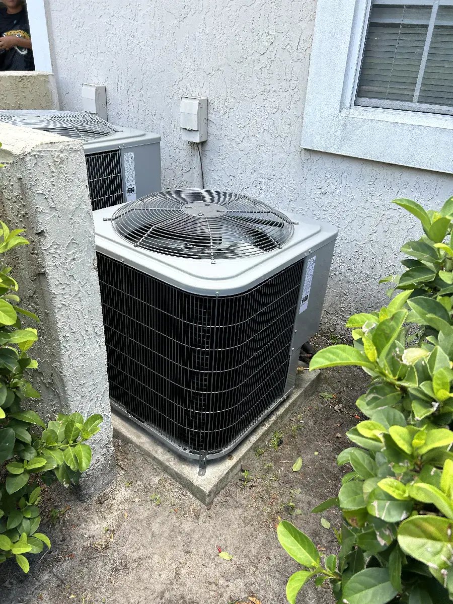 New condenser unit installed outside a Florida home