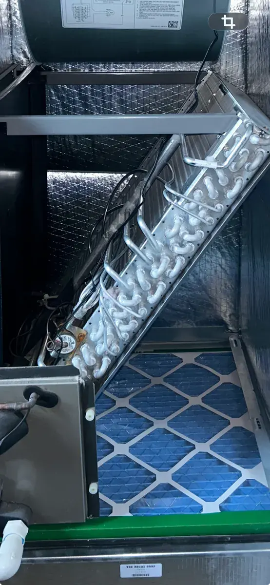 Interior view of a new evaporator coil and air filter