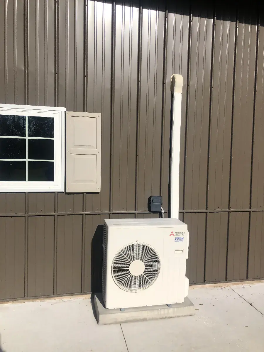 Mini-split outdoor unit with refrigerant line connections